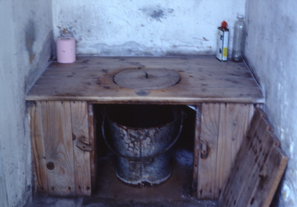 Close-up of bucket latrine